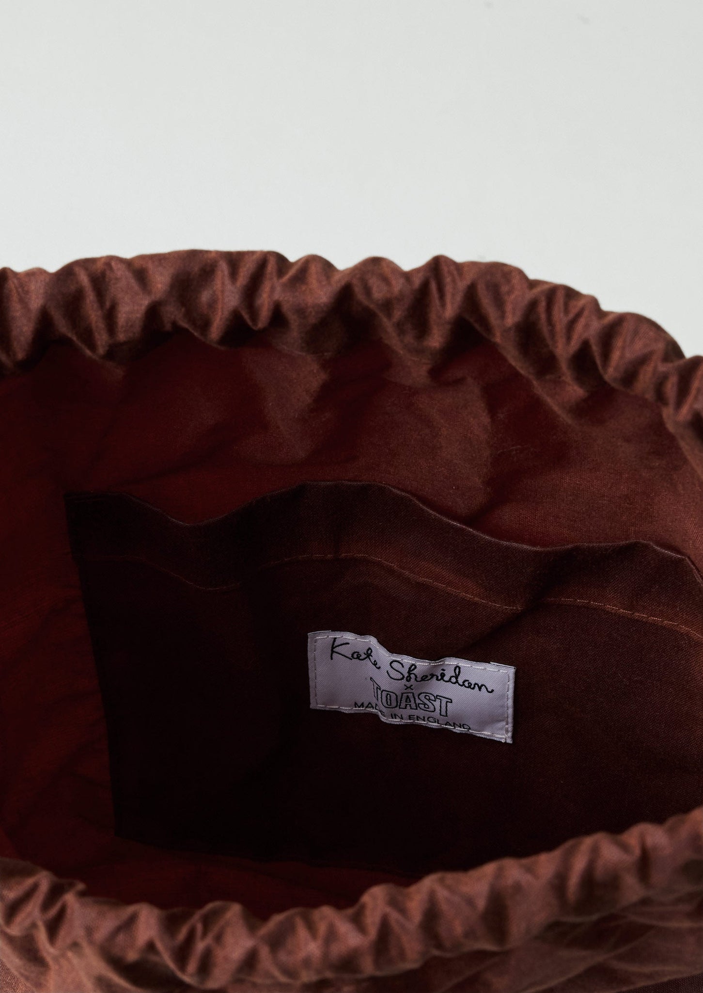 Kate Sheridan Waxed Cotton Bow Rucksack | Chestnut