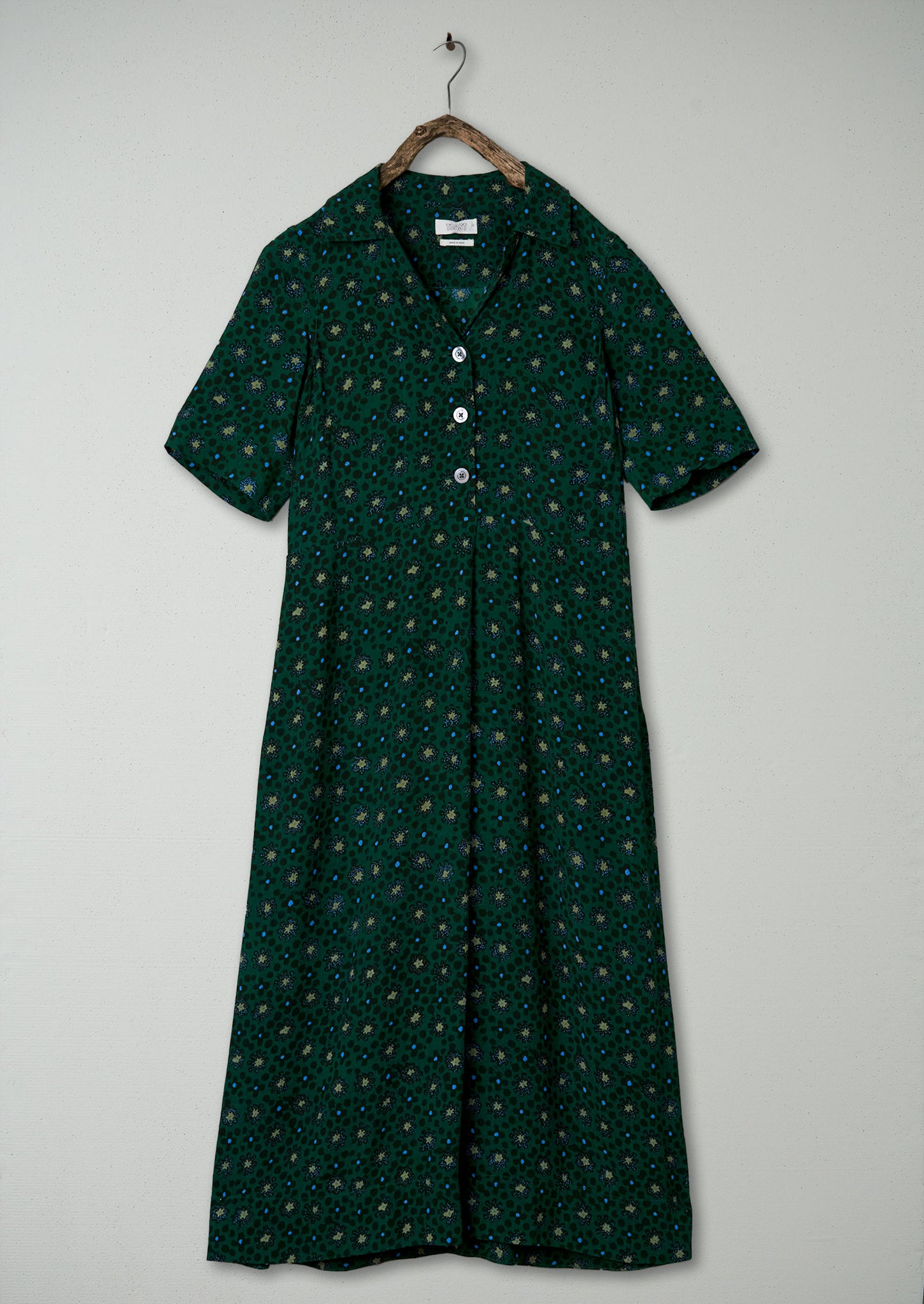 Green dotty dress deals