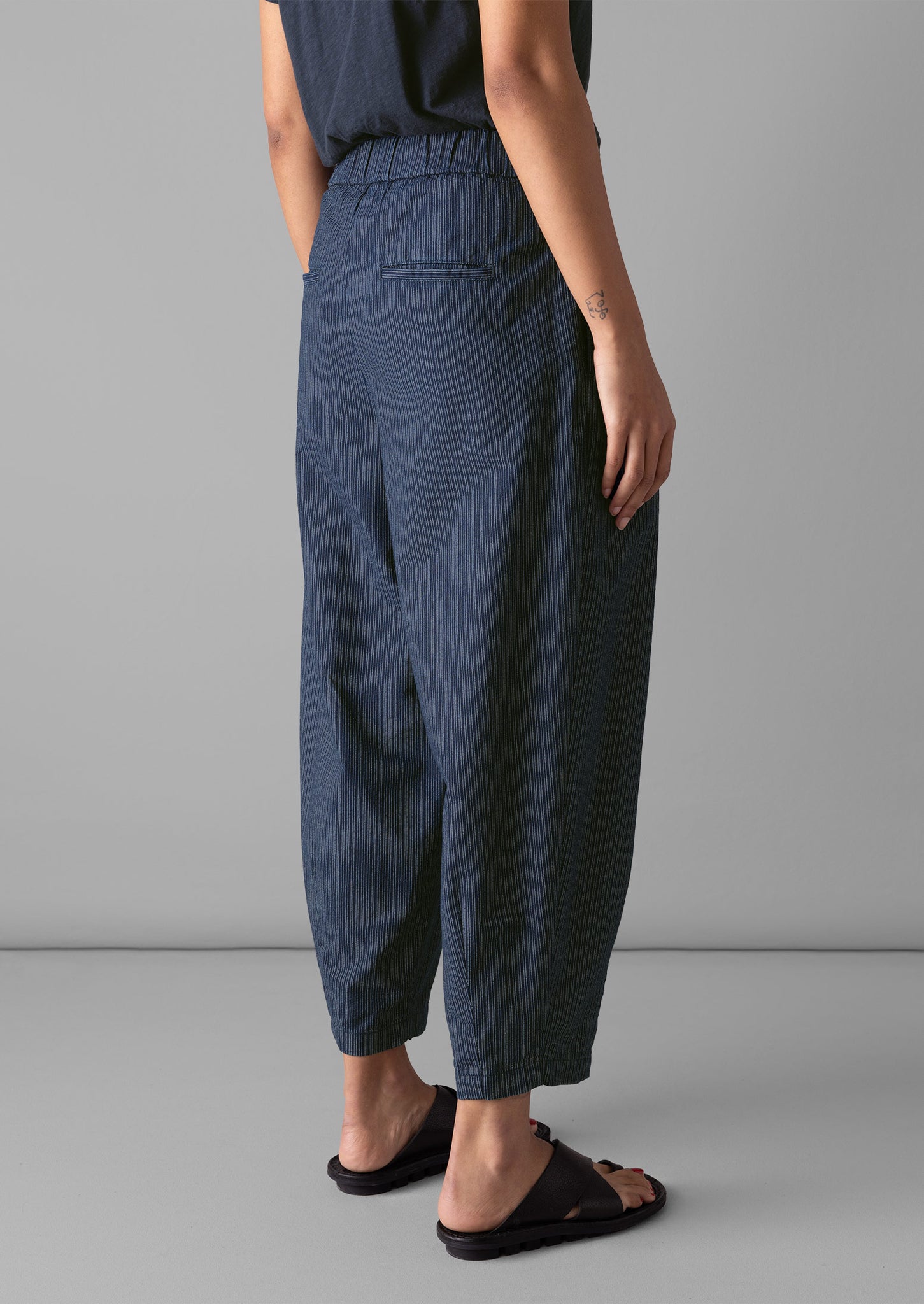 Striped navy trousers on sale